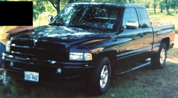 1996 black Dodge Ram 1500 (2000–2005)