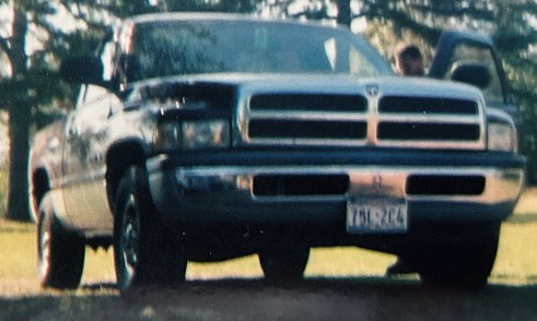 2001 burgundy and silver Dodge Ram 1500 (2006–2008)